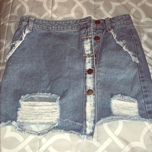 Cute ripped button up denim skirt!